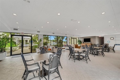 Carefree living awaits you with beautiful panoramic views of on Longboat Key Golf Club Resort in Florida - for sale on GolfHomes.com, golf home, golf lot