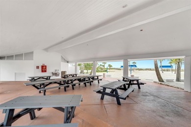 Carefree living awaits you with beautiful panoramic views of on Longboat Key Golf Club Resort in Florida - for sale on GolfHomes.com, golf home, golf lot