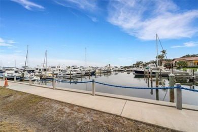 Carefree living awaits you with beautiful panoramic views of on Longboat Key Golf Club Resort in Florida - for sale on GolfHomes.com, golf home, golf lot