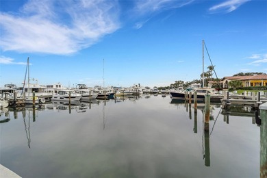 Carefree living awaits you with beautiful panoramic views of on Longboat Key Golf Club Resort in Florida - for sale on GolfHomes.com, golf home, golf lot