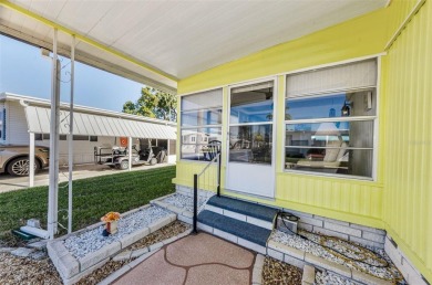 NEW PRICE ALERT - BEAUTIFULLY UPDATED DOUBLE-WIDE with FABULOUS on Tarpon Springs Golf Course in Florida - for sale on GolfHomes.com, golf home, golf lot