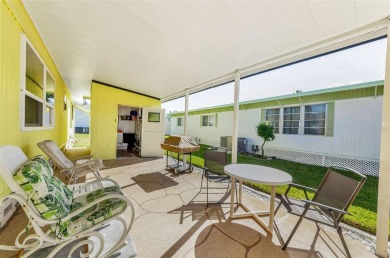 NEW PRICE ALERT - BEAUTIFULLY UPDATED DOUBLE-WIDE with FABULOUS on Tarpon Springs Golf Course in Florida - for sale on GolfHomes.com, golf home, golf lot