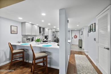 EXPERIENCE COASTAL LIVING AT ITS FINEST IN THIS STUNNING CONDO! on Oceans Golf Club in Florida - for sale on GolfHomes.com, golf home, golf lot