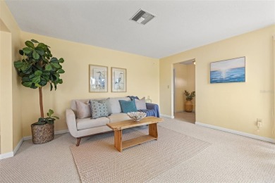 This spacious 4-bedroom, 3-bath POOL home is located in the on Mangrove Bay Golf Course in Florida - for sale on GolfHomes.com, golf home, golf lot