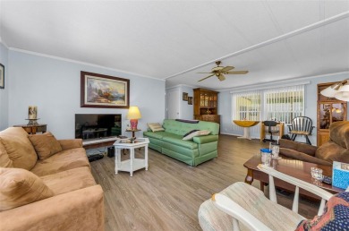 NEW PRICE ALERT - BEAUTIFULLY UPDATED DOUBLE-WIDE with FABULOUS on Tarpon Springs Golf Course in Florida - for sale on GolfHomes.com, golf home, golf lot