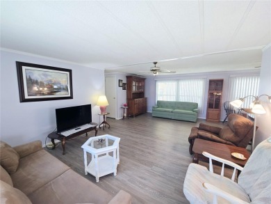 NEW PRICE ALERT - BEAUTIFULLY UPDATED DOUBLE-WIDE with FABULOUS on Tarpon Springs Golf Course in Florida - for sale on GolfHomes.com, golf home, golf lot