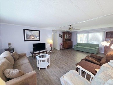 NEW PRICE ALERT - BEAUTIFULLY UPDATED DOUBLE-WIDE with FABULOUS on Tarpon Springs Golf Course in Florida - for sale on GolfHomes.com, golf home, golf lot