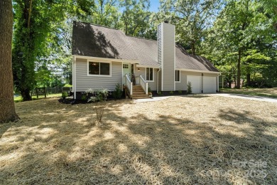 PRIMARY bedroom on the MAIN and on a GOLF COURSE! Unique on Raintree Country Club in North Carolina - for sale on GolfHomes.com, golf home, golf lot