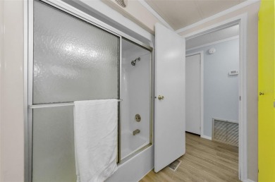 NEW PRICE ALERT - BEAUTIFULLY UPDATED DOUBLE-WIDE with FABULOUS on Tarpon Springs Golf Course in Florida - for sale on GolfHomes.com, golf home, golf lot