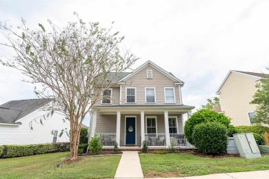 Bright and inviting 3-bedroom, 2.5-bath home with detached 2-car on Southwood Golf Club in Florida - for sale on GolfHomes.com, golf home, golf lot