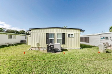 NEW PRICE ALERT - BEAUTIFULLY UPDATED DOUBLE-WIDE with FABULOUS on Tarpon Springs Golf Course in Florida - for sale on GolfHomes.com, golf home, golf lot