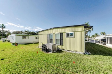 NEW PRICE ALERT - BEAUTIFULLY UPDATED DOUBLE-WIDE with FABULOUS on Tarpon Springs Golf Course in Florida - for sale on GolfHomes.com, golf home, golf lot