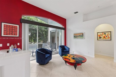 Spacious, meticulously maintained home in a gated community with on Woodmont Country Club in Florida - for sale on GolfHomes.com, golf home, golf lot