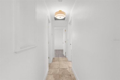 Fully Renovated 2 Bed, 1 Bath Home - New Roof, New AC, Impact on Rotonda Golf and Country Club The Hills Course in Florida - for sale on GolfHomes.com, golf home, golf lot