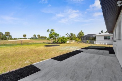 Fully Renovated 2 Bed, 1 Bath Home - New Roof, New AC, Impact on Rotonda Golf and Country Club The Hills Course in Florida - for sale on GolfHomes.com, golf home, golf lot