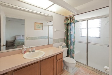 Set on an oversized 14,520 sq ft lot, this well-maintained home on Sandpiper Golf Club in Florida - for sale on GolfHomes.com, golf home, golf lot