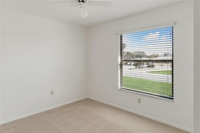 Set on an oversized 14,520 sq ft lot, this well-maintained home on Sandpiper Golf Club in Florida - for sale on GolfHomes.com, golf home, golf lot