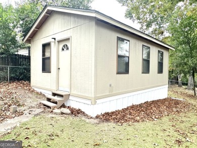 Discover this lovely and meticulously maintained, custom-built on Lakewood Golf Course in Alabama - for sale on GolfHomes.com, golf home, golf lot