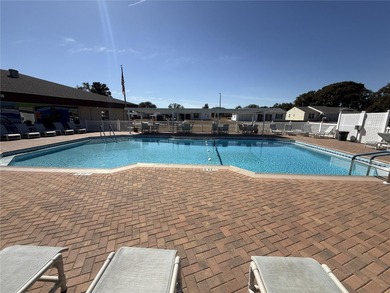 Set on an oversized 14,520 sq ft lot, this well-maintained home on Sandpiper Golf Club in Florida - for sale on GolfHomes.com, golf home, golf lot