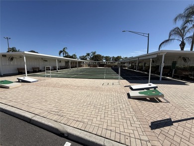 Set on an oversized 14,520 sq ft lot, this well-maintained home on Sandpiper Golf Club in Florida - for sale on GolfHomes.com, golf home, golf lot