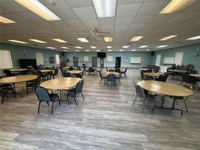 Set on an oversized 14,520 sq ft lot, this well-maintained home on Sandpiper Golf Club in Florida - for sale on GolfHomes.com, golf home, golf lot