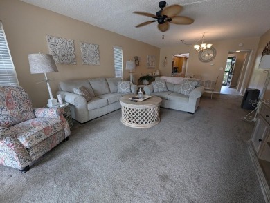 Experience Florida living at its finest in this exceptionally on Bayou Golf Club in Florida - for sale on GolfHomes.com, golf home, golf lot