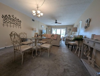 Experience Florida living at its finest in this exceptionally on Bayou Golf Club in Florida - for sale on GolfHomes.com, golf home, golf lot