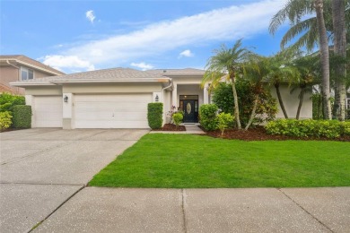 Welcome to your dream home at 9402 Woodbay Drive, where modern on Westchase Golf Club in Florida - for sale on GolfHomes.com, golf home, golf lot