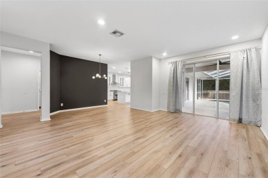 Welcome to your dream home at 9402 Woodbay Drive, where modern on Westchase Golf Club in Florida - for sale on GolfHomes.com, golf home, golf lot