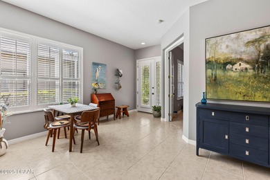 This 2 bed 2 bath + Bonus room, single-story end-unit townhome on Plantation Bay Golf and Country Club in Florida - for sale on GolfHomes.com, golf home, golf lot