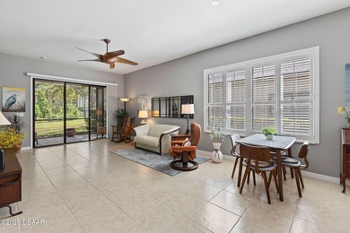 This 2 bed 2 bath + Bonus room, single-story end-unit townhome on Plantation Bay Golf and Country Club in Florida - for sale on GolfHomes.com, golf home, golf lot