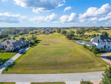 Under contract-accepting backup offers. Exclusive 1.09 Acre Lot on Lake Jovita Golf and Country Club in Florida - for sale on GolfHomes.com, golf home, golf lot