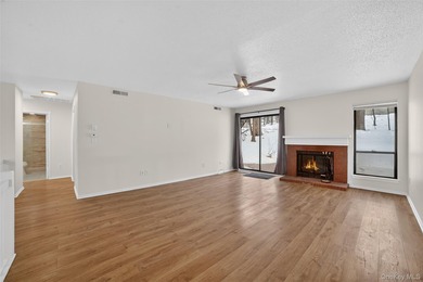 Rare end unit offering a unique and desirable layout with a on Somers Pointe Golf Club - West Hill in New York - for sale on GolfHomes.com, golf home, golf lot