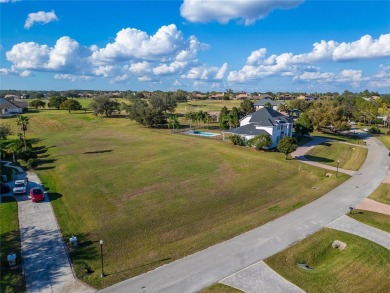 Under contract-accepting backup offers. Exclusive 1.09 Acre Lot on Lake Jovita Golf and Country Club in Florida - for sale on GolfHomes.com, golf home, golf lot