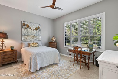 This 2 bed 2 bath + Bonus room, single-story end-unit townhome on Plantation Bay Golf and Country Club in Florida - for sale on GolfHomes.com, golf home, golf lot