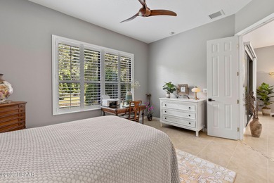 This 2 bed 2 bath + Bonus room, single-story end-unit townhome on Plantation Bay Golf and Country Club in Florida - for sale on GolfHomes.com, golf home, golf lot