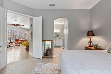 This 2 bed 2 bath + Bonus room, single-story end-unit townhome on Plantation Bay Golf and Country Club in Florida - for sale on GolfHomes.com, golf home, golf lot