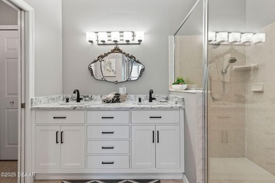 This 2 bed 2 bath + Bonus room, single-story end-unit townhome on Plantation Bay Golf and Country Club in Florida - for sale on GolfHomes.com, golf home, golf lot