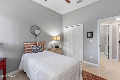 This 2 bed 2 bath + Bonus room, single-story end-unit townhome on Plantation Bay Golf and Country Club in Florida - for sale on GolfHomes.com, golf home, golf lot