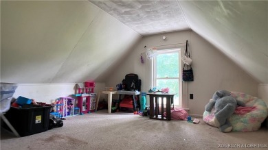 Charming 4-bedroom, 1-bath home in the heart of Tipton! This on Tipton Country Club in Missouri - for sale on GolfHomes.com, golf home, golf lot