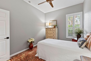 This 2 bed 2 bath + Bonus room, single-story end-unit townhome on Plantation Bay Golf and Country Club in Florida - for sale on GolfHomes.com, golf home, golf lot