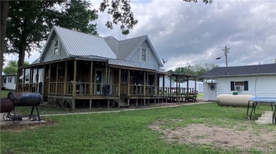 Charming 4-bedroom, 1-bath home in the heart of Tipton! This on Tipton Country Club in Missouri - for sale on GolfHomes.com, golf home, golf lot