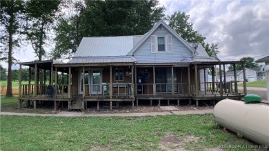 Charming 4-bedroom, 1-bath home in the heart of Tipton! This on Tipton Country Club in Missouri - for sale on GolfHomes.com, golf home, golf lot