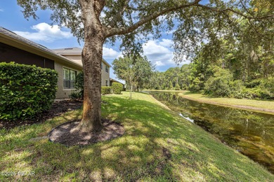 This 2 bed 2 bath + Bonus room, single-story end-unit townhome on Plantation Bay Golf and Country Club in Florida - for sale on GolfHomes.com, golf home, golf lot