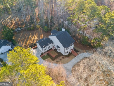 Welcome to the prestigious Newnan Country Club, a secluded haven on Newnan Country Club in Georgia - for sale on GolfHomes.com, golf home, golf lot