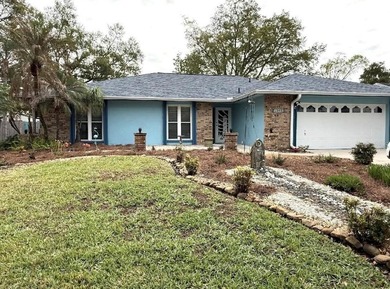 DISCOVER SERENITY IN YOUR PRIVATE BACKYARD OASIS! This 3-BEDROOM on Rio Pinar Golf and Country Club in Florida - for sale on GolfHomes.com, golf home, golf lot