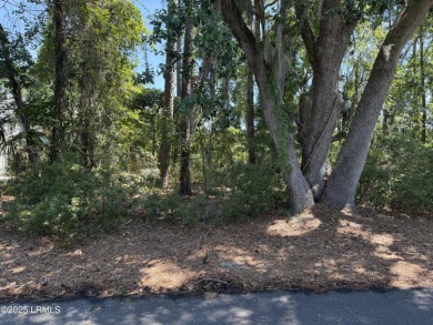 Vacant Homesite located on hole 7 of the Morgan River golf on Dataw Island Club in South Carolina - for sale on GolfHomes.com, golf home, golf lot