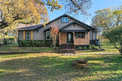 Discover this fully renovated farmhouse situated on a 1.37 acre on Denton Country Club in Texas - for sale on GolfHomes.com, golf home, golf lot