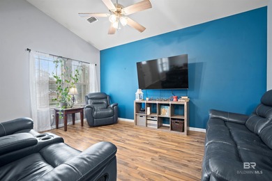 Welcome home to this precious cottage tucked away on a quiet on Lake Forest Yacht and Country Club in Alabama - for sale on GolfHomes.com, golf home, golf lot