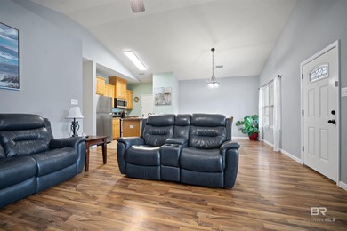 Welcome home to this precious cottage tucked away on a quiet on Lake Forest Yacht and Country Club in Alabama - for sale on GolfHomes.com, golf home, golf lot